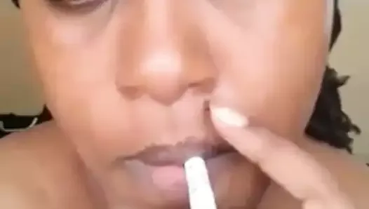 Kenian slut Aisha smoking cigarette hot