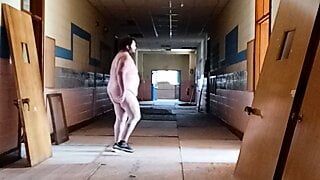 Mofo2121 walks around an abandoned school naked