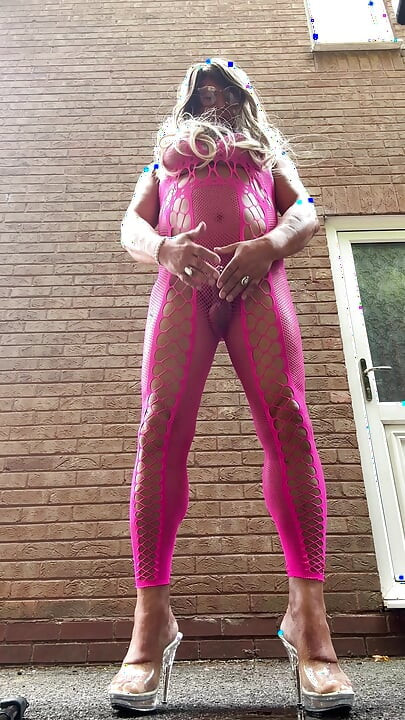 Sexy Crossdresser Kellycd2022's in pink fishnet catsuit and heels