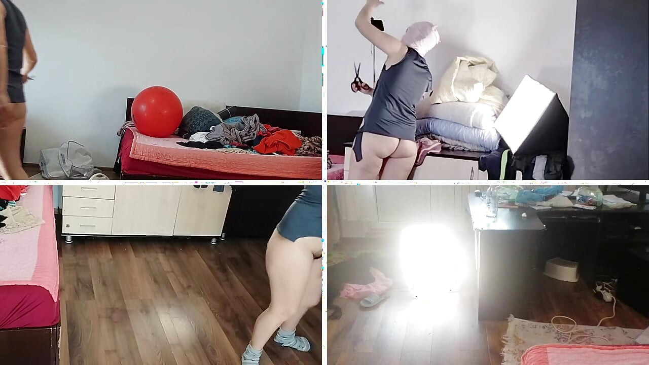Amateur wife dancing naked at home. Amateur woman has fun trying on clothes and cutting them