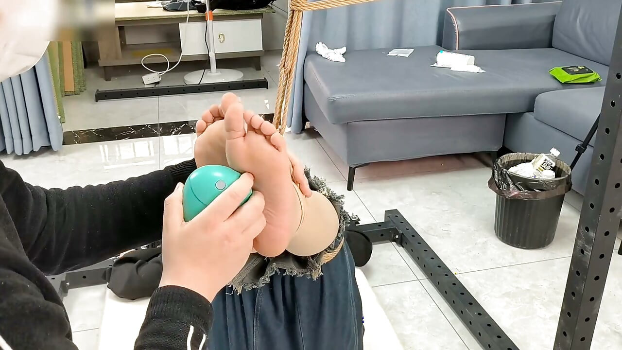 My Girlfriend Was Tied to an Iron Frame, Her Bare Feet Suspended and Tickled