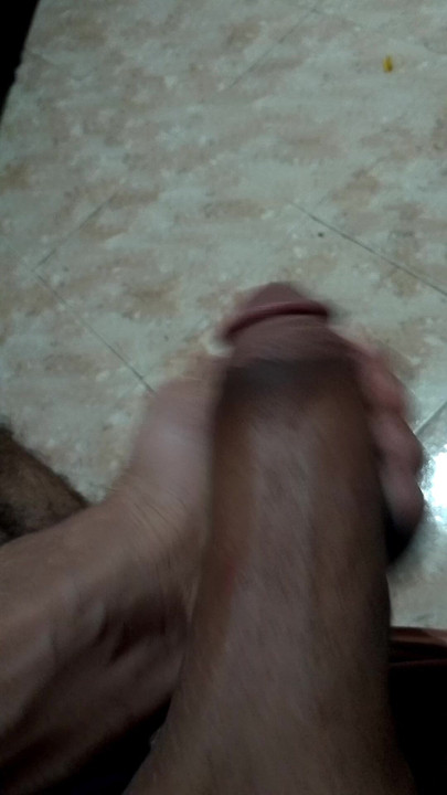 Rubbing the fat huge cock