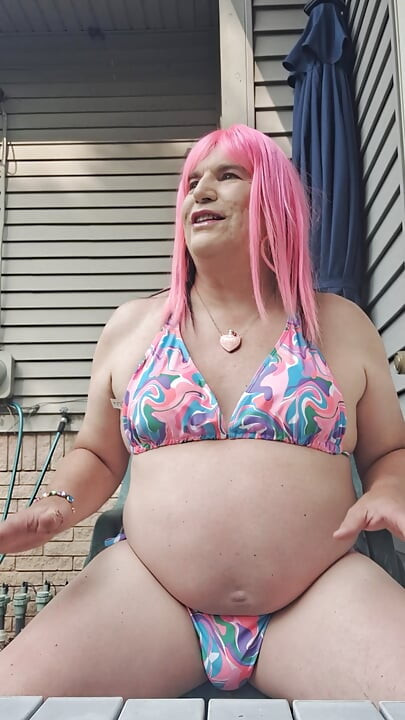 Feeling horny in my new bathing suit outside on the patio!