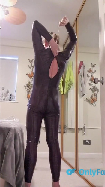 Stunning moment from "Essex Girl Lisa dressing up in my latex catsuit"