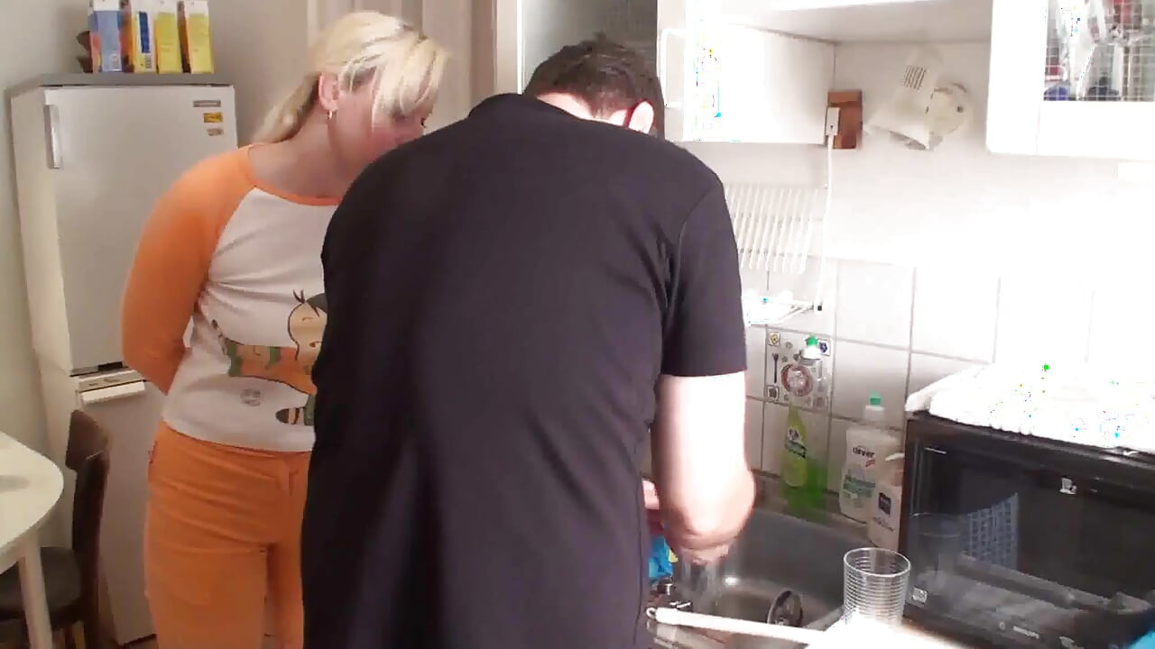 Washing dishes, biting rubbish