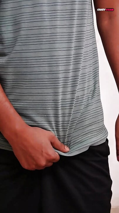 A sexy guy is dancing while holding his cock.