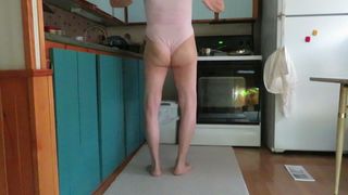 Leotard sissy shows his feminine ass and hips