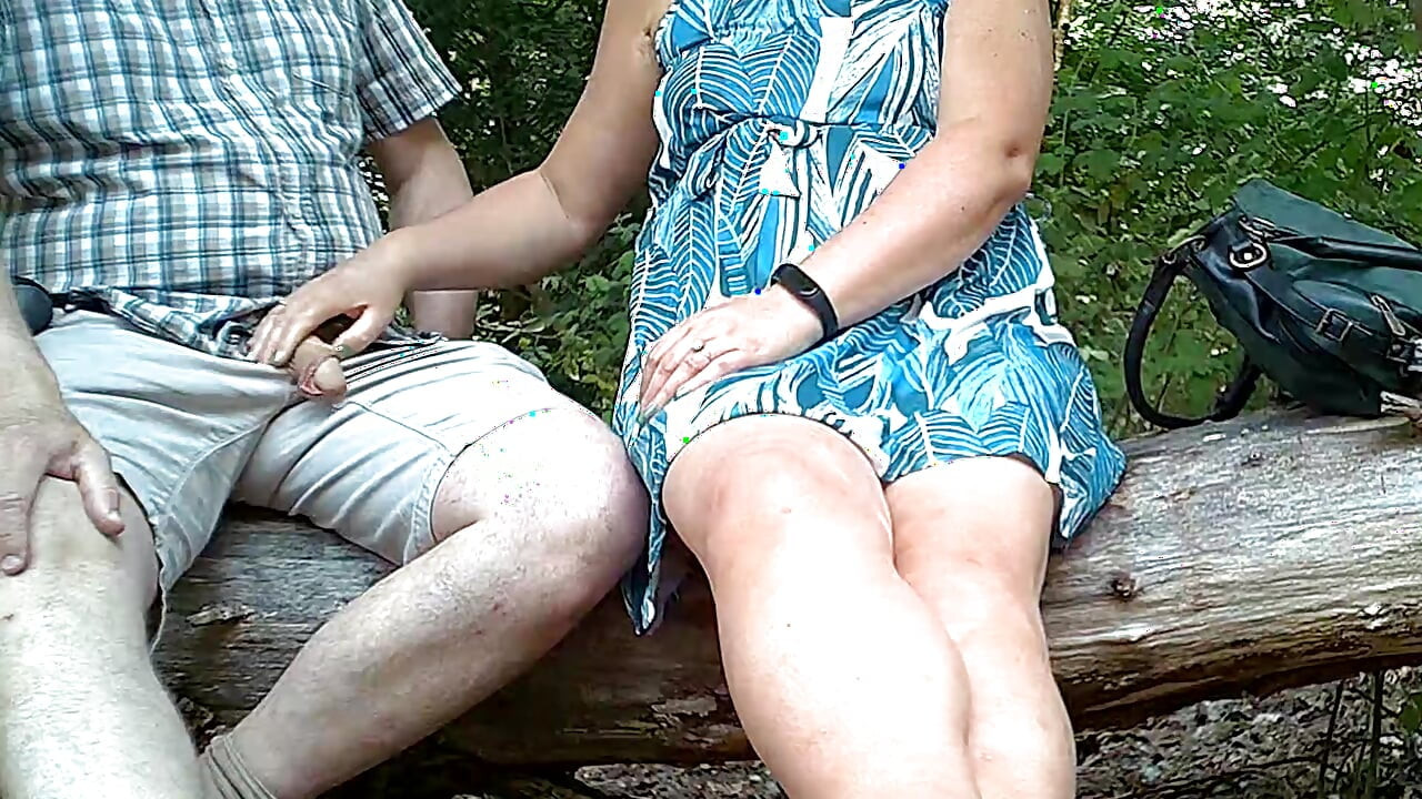 Handjob outdoors in the park in hot weather