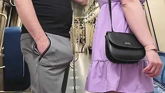 Almost Seen by Subway Passengers When She Touch Stranger's Dick Through Pants