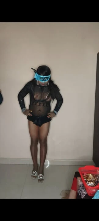 Crossdresser in Sparkling Body stocking