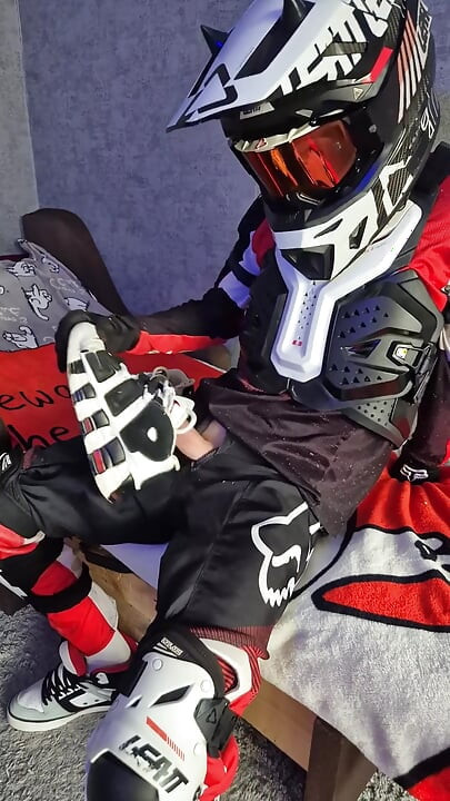 An Excited Guy in Motorcycle Gear Fucks His Sneakers
