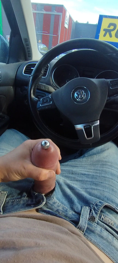 Wanking pumped cock with penis plug  in public parking