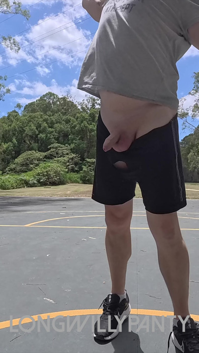 Straight guy hanging out his uncut cock at the public space.
