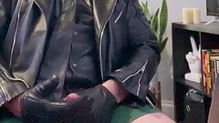 Daddy in leather suit jerks off with gloves