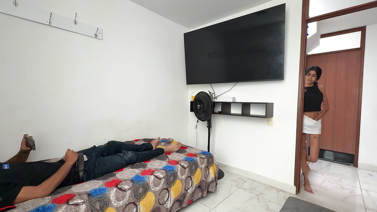 My stepbrother is in his room touching his huge cock and I take the opportunity to watch him cum on the