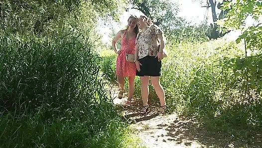 Two women girl and mature milf took off red panties peeing on side of road in public Pee Outdoor Outside  Lesbians kiss