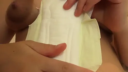 stepsister shows her the maxi pads then shows her how to use them and puts the pads in her panties then plays with her pussy