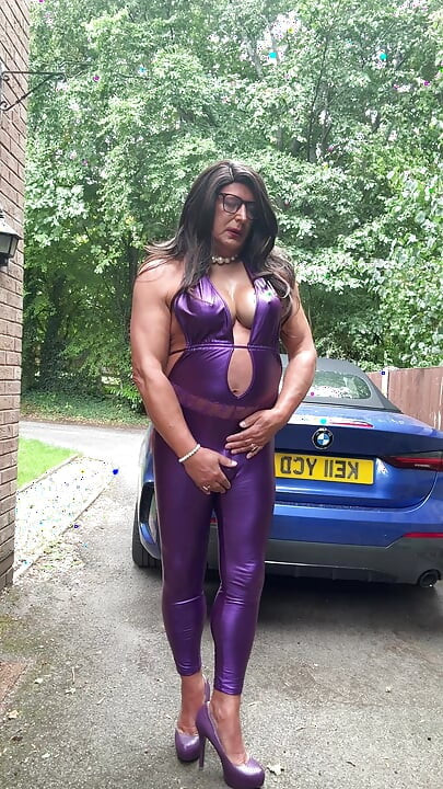 Sexy Crossdresser kellycd2022 in purple pvc catsuit and heels