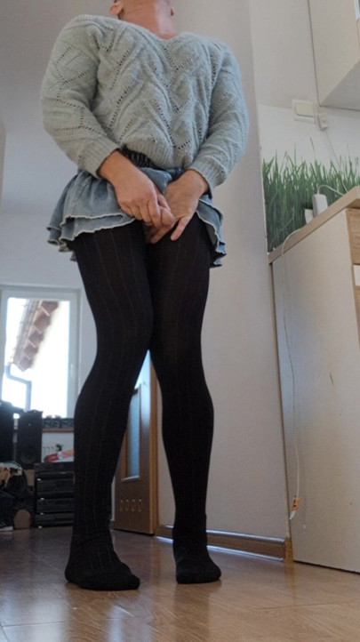 In zoete panty en sweter