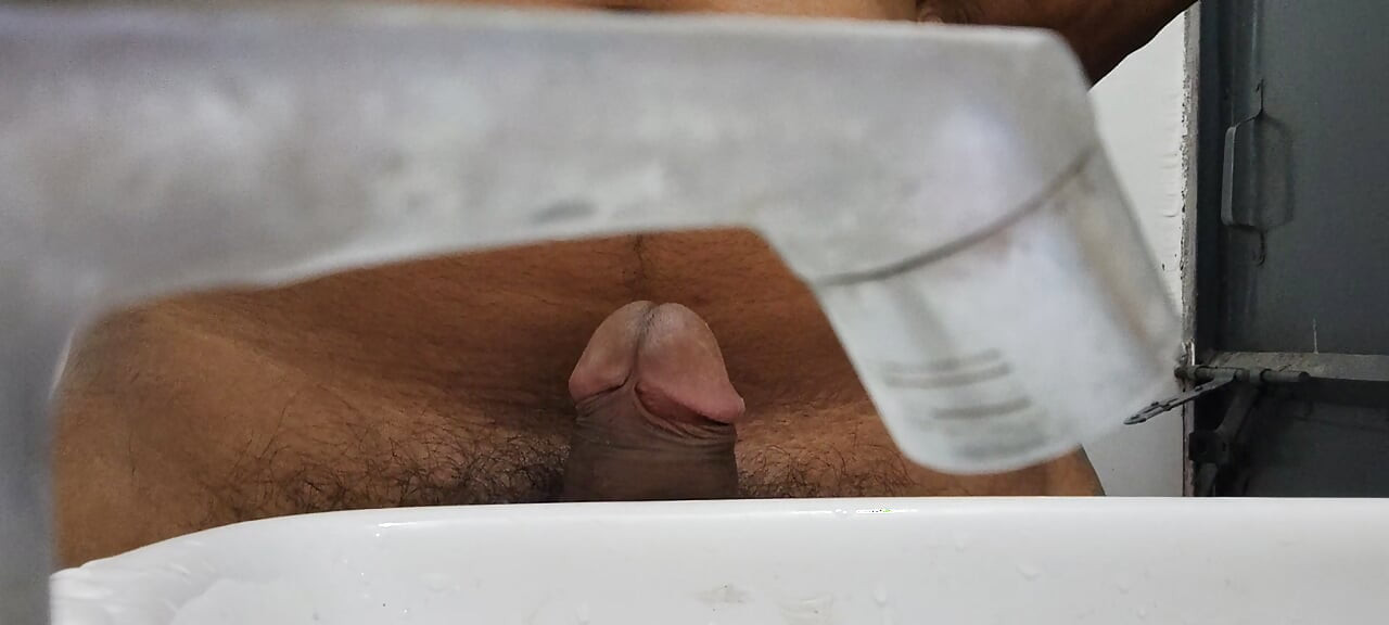Gay handjob and cumming in a rowboat on a lake in the Alps.