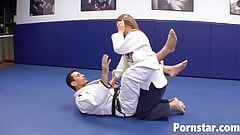 Megan Fenox does karate and with handsome coach