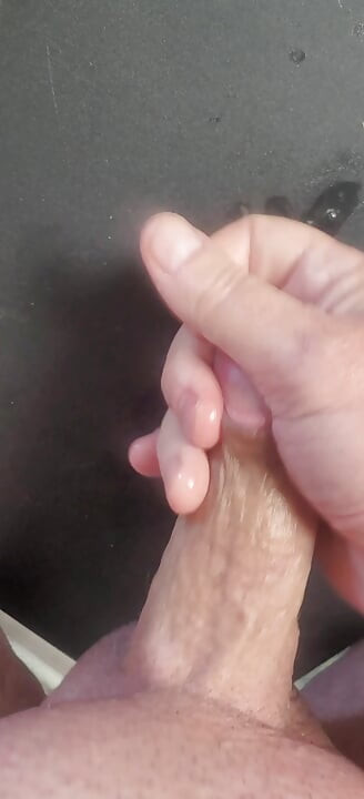 Just stroking and oozing cum shot with a spitlube missing the target
