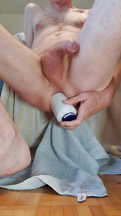 I Squat on a Series of small bottles. Male anal insertion and cum
