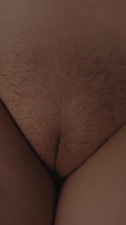 Key moment from "Nighttime marital sex. Close-ups of a hairy pussy."