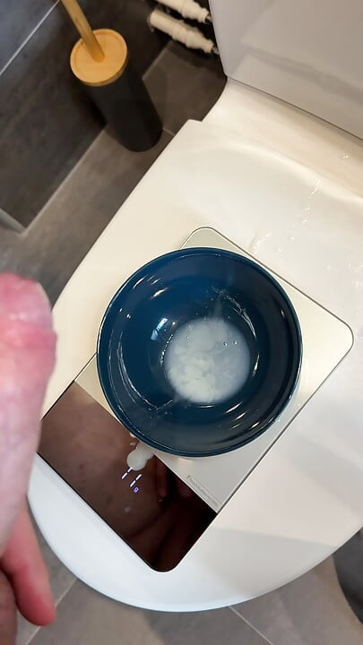 Huge cumshot in a bowl