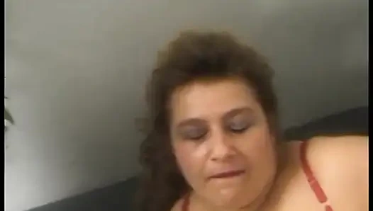 Mature lady loves dancing around and taking off her clothes