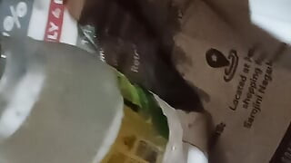 Put the bottle in the dirt and took out the water of the load.