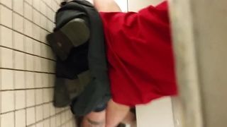 two guys blowing each other in a bathroom