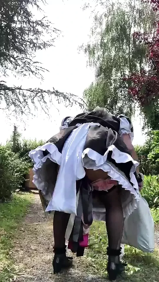 In a black and white maid outfit for a day