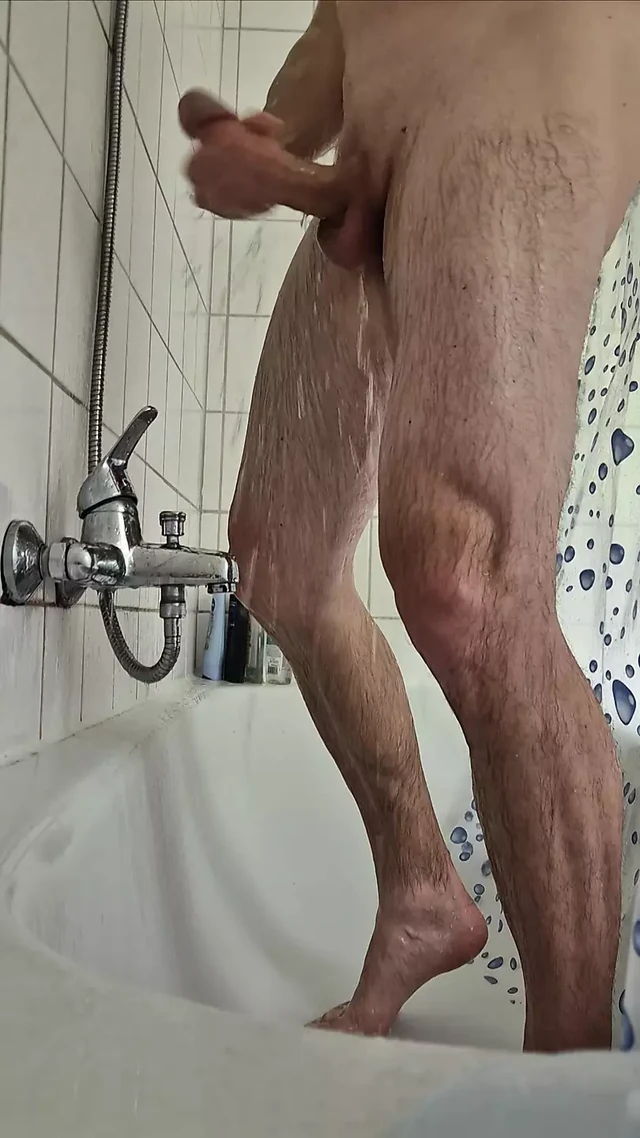 In the shower jerking off the hard cock