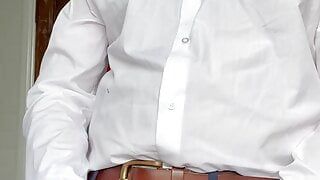 Wank and cumshot in buttoned up white shirt.