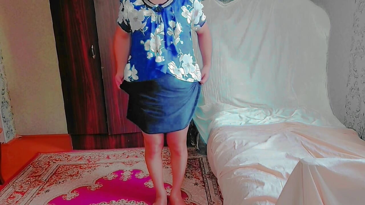 Sweet shemale walking through garden in summer breeze