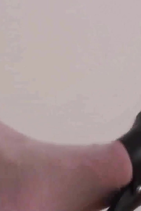 Jessica's dangling black plateau heels