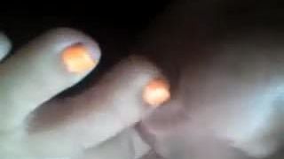 Auto-adoração dos dedos do pé laranja