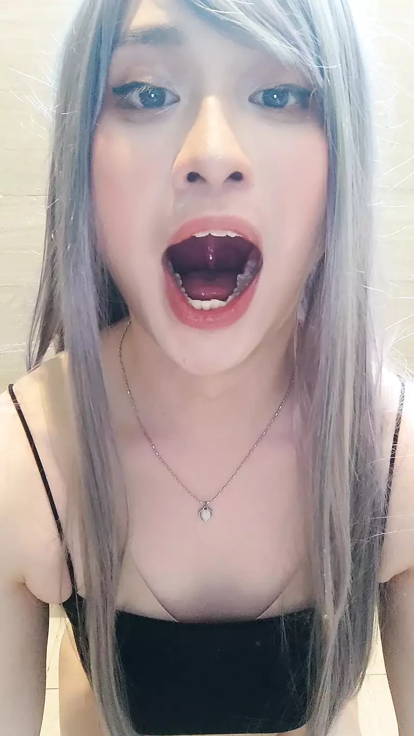 Femboy sucks on dildo and deepthroats it