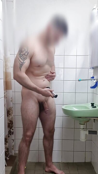 Shaving chest and cock in shower
