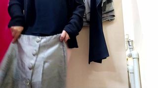 OMG! Russian mommy trying on skirts in a fitting room