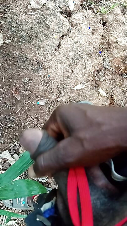 An Africans guy trying to wake his big dick