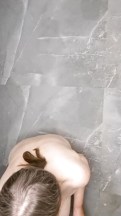 Busty naked GILF enjoy shower