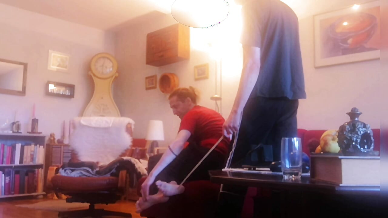 Amateurboy is caned on feet and ass