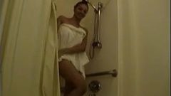 Gia shows off her gorgeous body under the shower