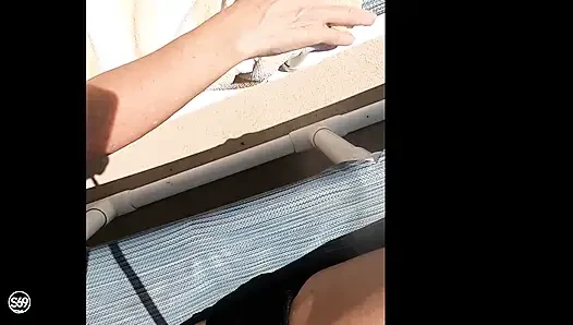 Sunning on the balcony in plain view of everyone walking by