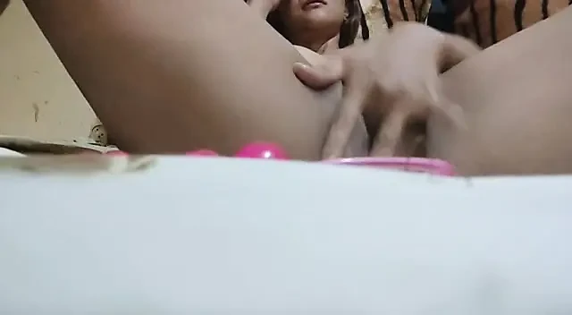 Asian Milf  tries to wet her vagina with her fingers and dildo