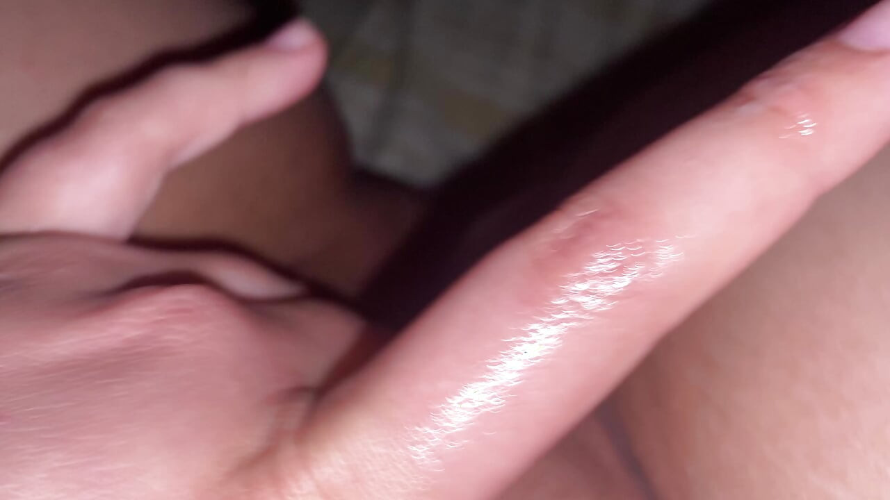 Girl rubs and penetrates the clitoris with her fingers, do you like to see her?