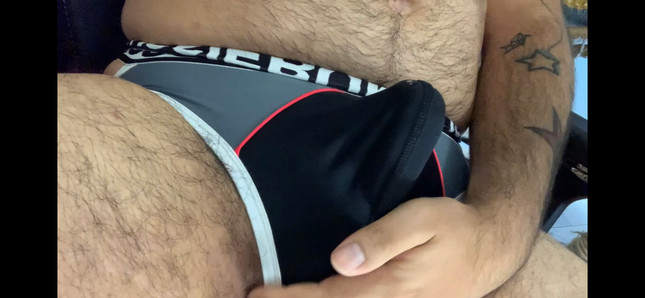 Lycra Frot in a jock clearly too small for him until cums inside his foreskin