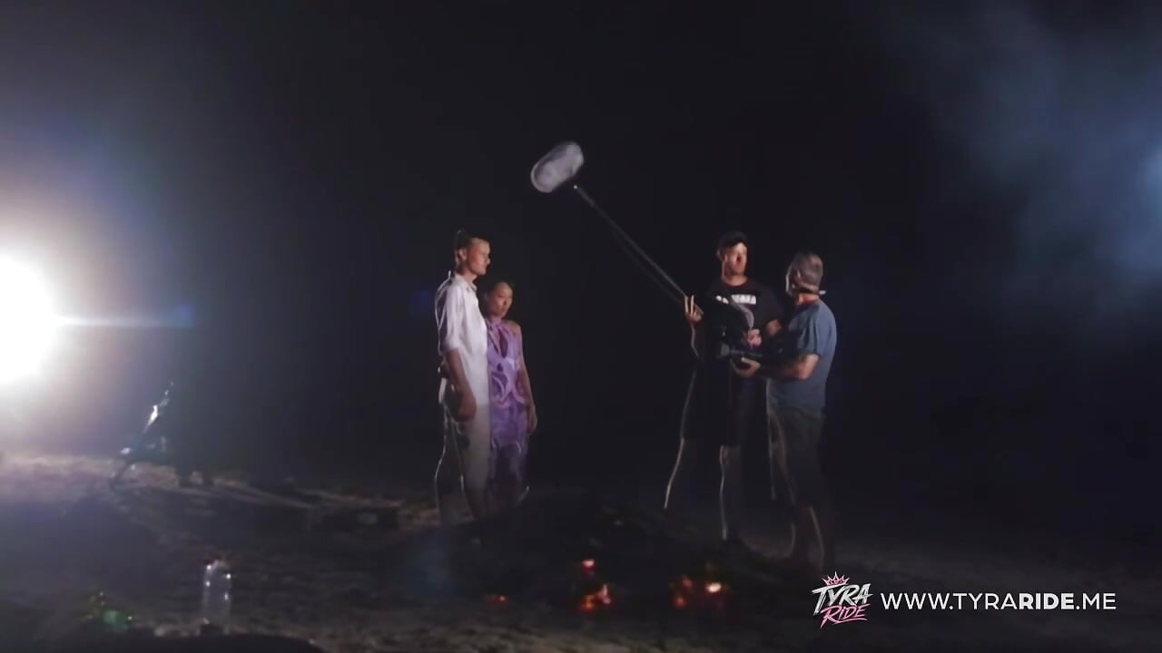 Blonde in Car During Nude Beach Film Shoot with Crew